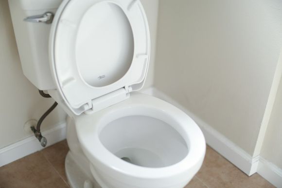 Toilet - white ceramic toilet bowl with cover