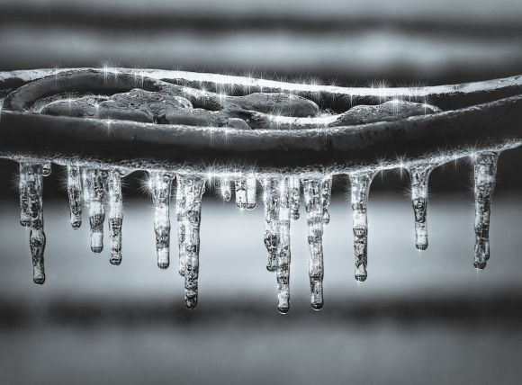 Snow Pipes - grayscale photography of water drops ice