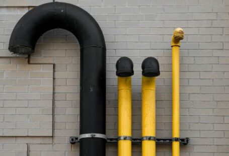 Pipes - yellow and black metal pipe