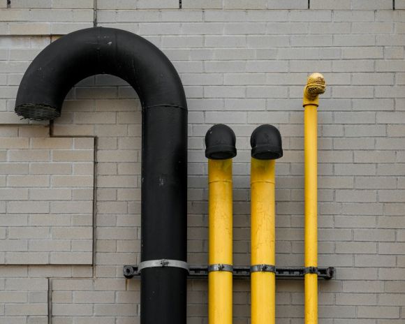 Pipes - yellow and black metal pipe